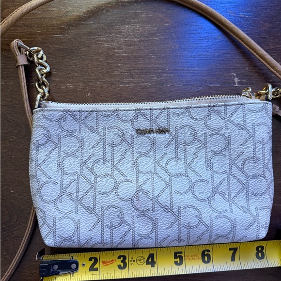 Calvin Klein Handbags - Calvin Klein Cream Logo Crossbody Bag with Gold Hardware